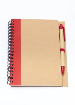 Notebook and pen for taking notes.