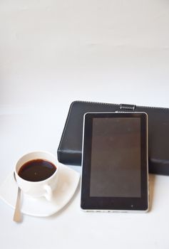 black coffee and tablet PC on white background