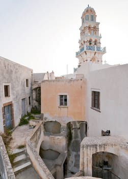 Old town in Emporio with stairs, arcs, passages and doors