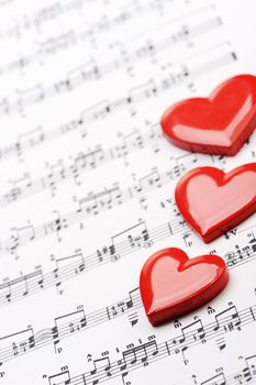 close up of sheet music with heart