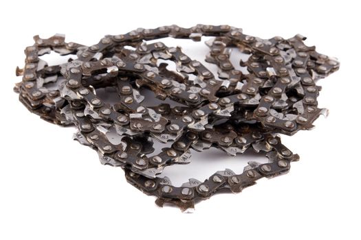 used chainsaw chain on a white background