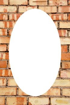 Isolated white oval place for text photograph image in center of frame. Fragment of old squared red brick wall.