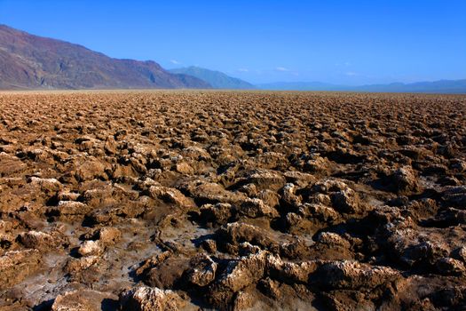 Rugged rocky landscape of Devils Golf Course in Death Valley National Park California.