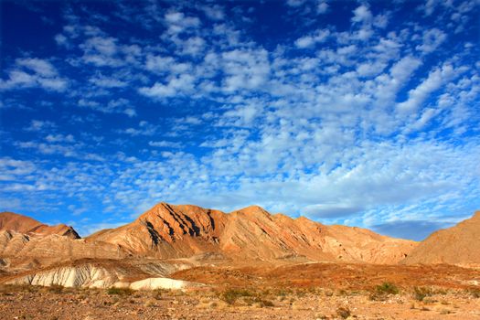 Clouds form an intricate pattern over the desert landscape of Lake Mead National Recreation Area in Nevada.
