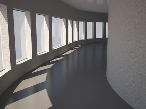 A long gray corridor with big windows