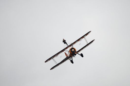 LONDON, UK, Saturday July 14, 2012. The Breitling Wingwalkers displaying at Farnborough International Airshow 2012. The Breitling Wingwalkers fly on Boeing-Stearman Model 75.