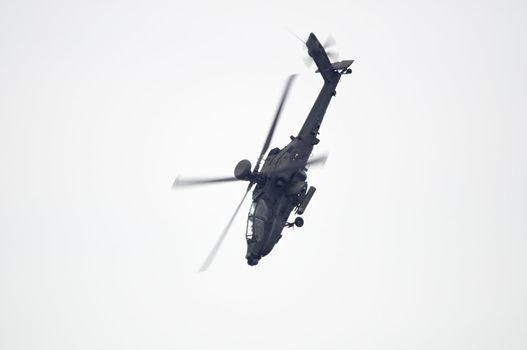 LONDON, UK, Saturday July 14, 2012. The Boeing AH-64 Apache displaying at Farnborough International Airshow 2012.