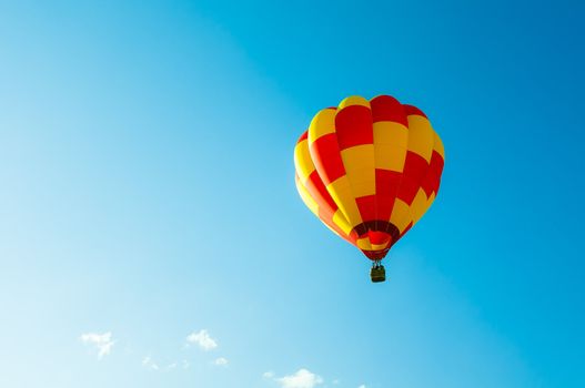 Two tone balllon in blue sky and little cloud