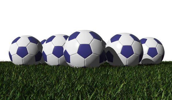 Blue soccer balls on a green grass - white background
