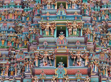 Sculptures on Hindu temple gopura (tower). Menakshi Temple, Madurai, Tamil Nadu, India