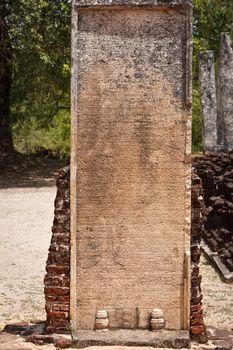 Ancient stone inscriptions in Singalese language texture. Pollonaruwa, Sri Lanka