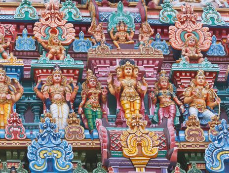 Sculptures on Hindu temple gopura (tower). Menakshi Temple, Madurai, Tamil Nadu, India