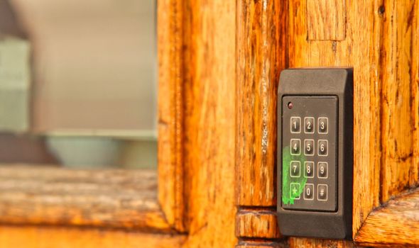 Old wooden door, with modern code opener