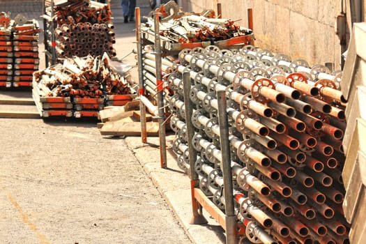 Framework gathered on the ground, in piles