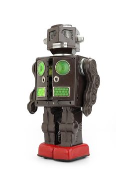 a  retro tin robot toy isolated on white background