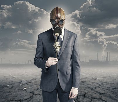 businessman with dried rose: concept polluted environment