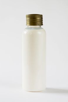 photo of white bottles of cosmetic products