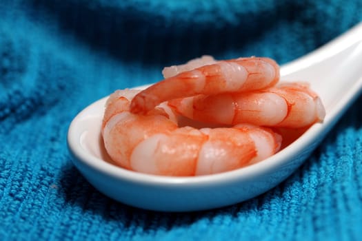 tasty fresh shrimps on a spoon