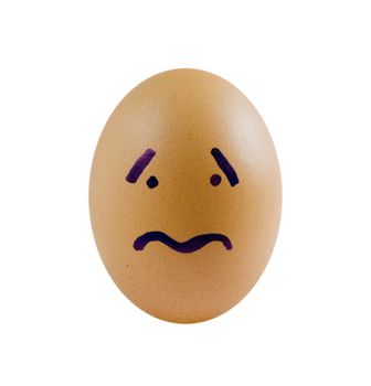 brown eggs with sad face on white background