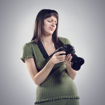 bad photo: photographer holds up a camera.
