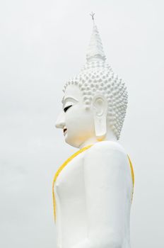 White Buddha on white sky in thailand