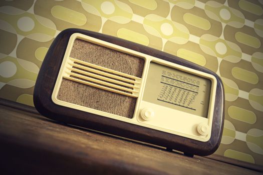 antique radio on vintage background