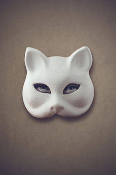 mysterious woman: woman's eyes with a cat mask