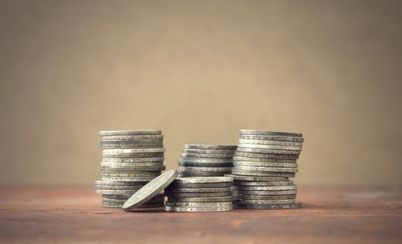 italian old coins on wooden table