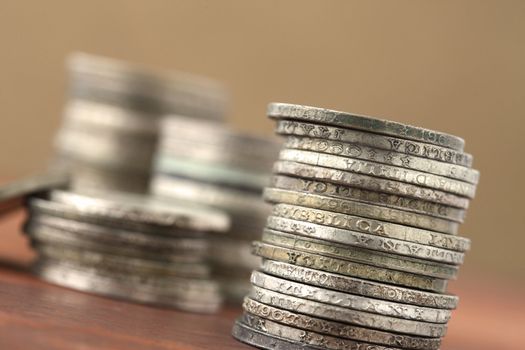 italian old coins on wooden table