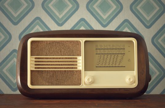 antique radio on vintage background