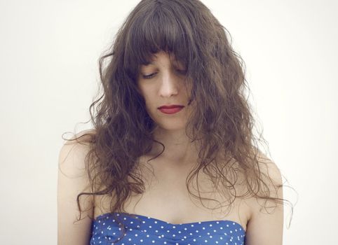 portrait photo of a sad and depressed young woman