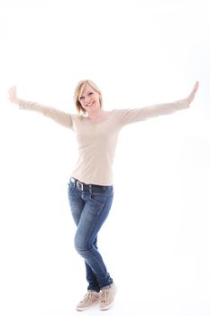 Cheerful woman in casual clothes with arms outstretched isolated on white