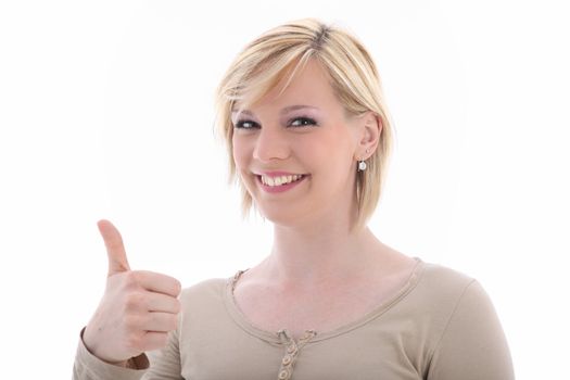 Studio shot of attractive smiling woman with thumb up isolated on white