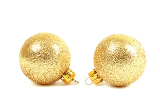Two golden christmas balls.