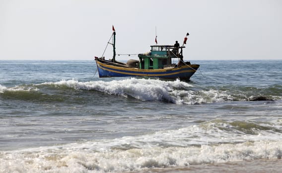 Lonely boat at ocean. Sri Lanka