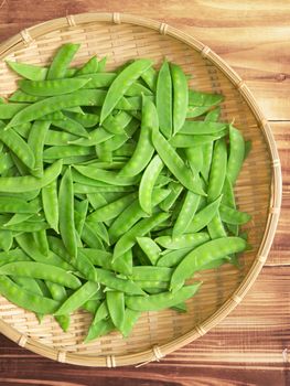 close up of a basket of snow peas