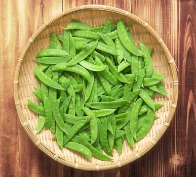 close up of a basket of snow peas