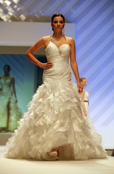ZAGREB, CROATIA - FEBRUARY 19: Fashion model walks the runway in wedding dress on 'Wedding days' show, February 19, 2012 in Zagreb, Croatia.