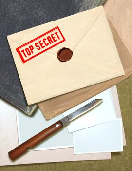 military top secret envelope with stamp and knife for papers