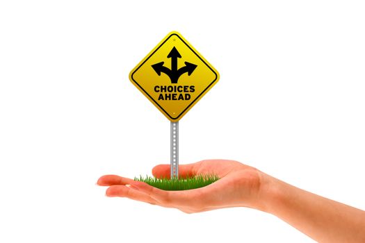 Hand holding a Choices Ahead street sign. 