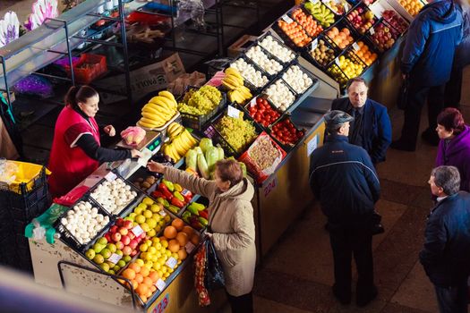 GOMEL, BELARUS - OCTOBER 22: Local people on the market sell local vegetable on October 22, 2011 in Gomel, Belarus.