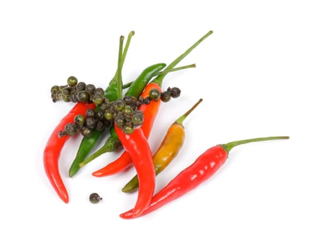 Mini Chili Peppers with pepper peas isolated on white background