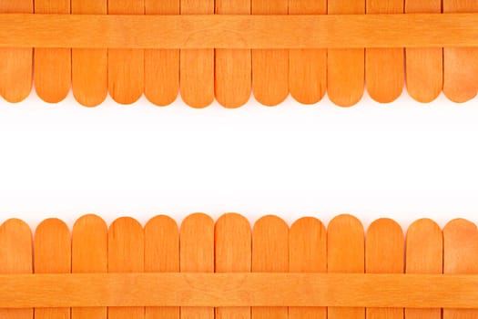 Orange wooden fence on white background