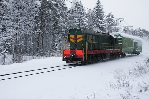 Small train moving in winter