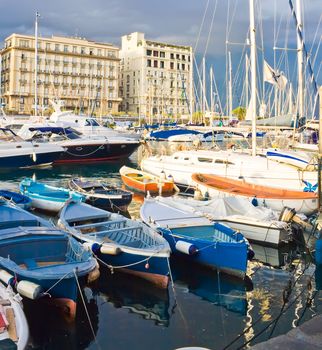 Small boats and yachts in the port of Naples, Italy
