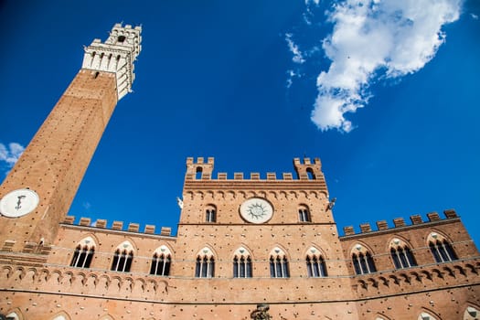 Italy, Siena, Piazza del Campo. Detail of Torre del Mangia, 700 years old