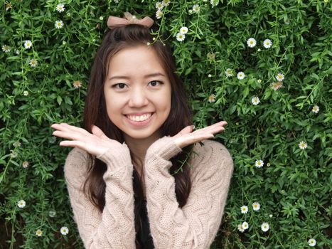 A smile of Asia beautiful girl  on a background of green nature       