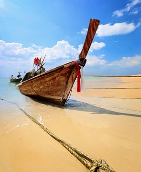 Traditional Thai longtail boat on the beach - Phuket