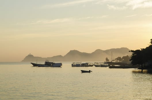 dili coastline with fishing boats in east timor, timor leste