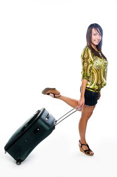 Photo of a young and beautiful girl with a suitcase, passport and ticket isolated on white background